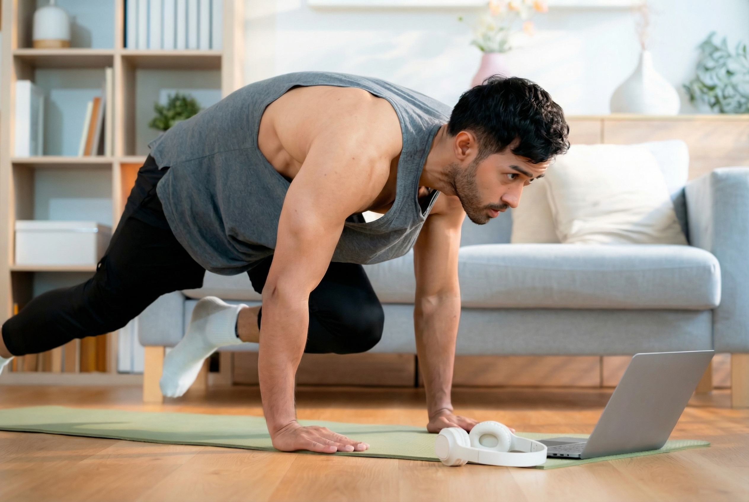Client training at home with laptop during an online training session